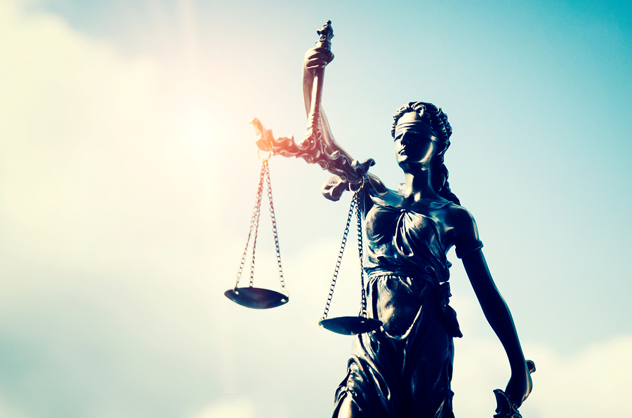 Lady justice themis statue of justice on sky background. law attorney court lawyer judge courtroom legal lady concept